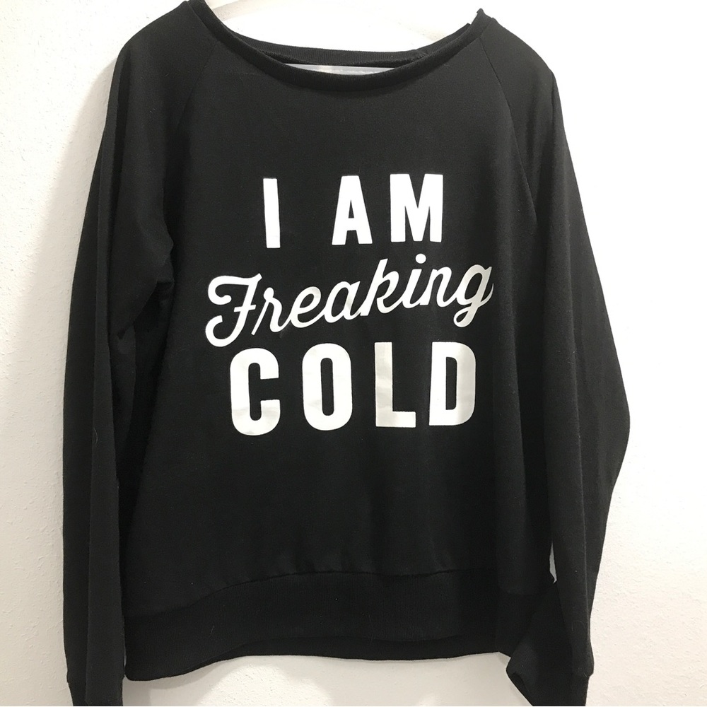 Women’s size medium black with white writing “I am freaking cold” sweatshirt.